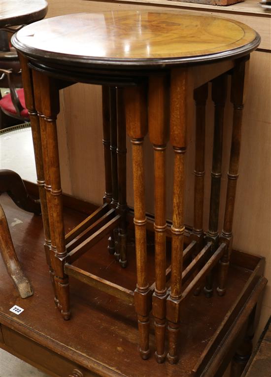 A nest of three walnut occasional tables W.47cm